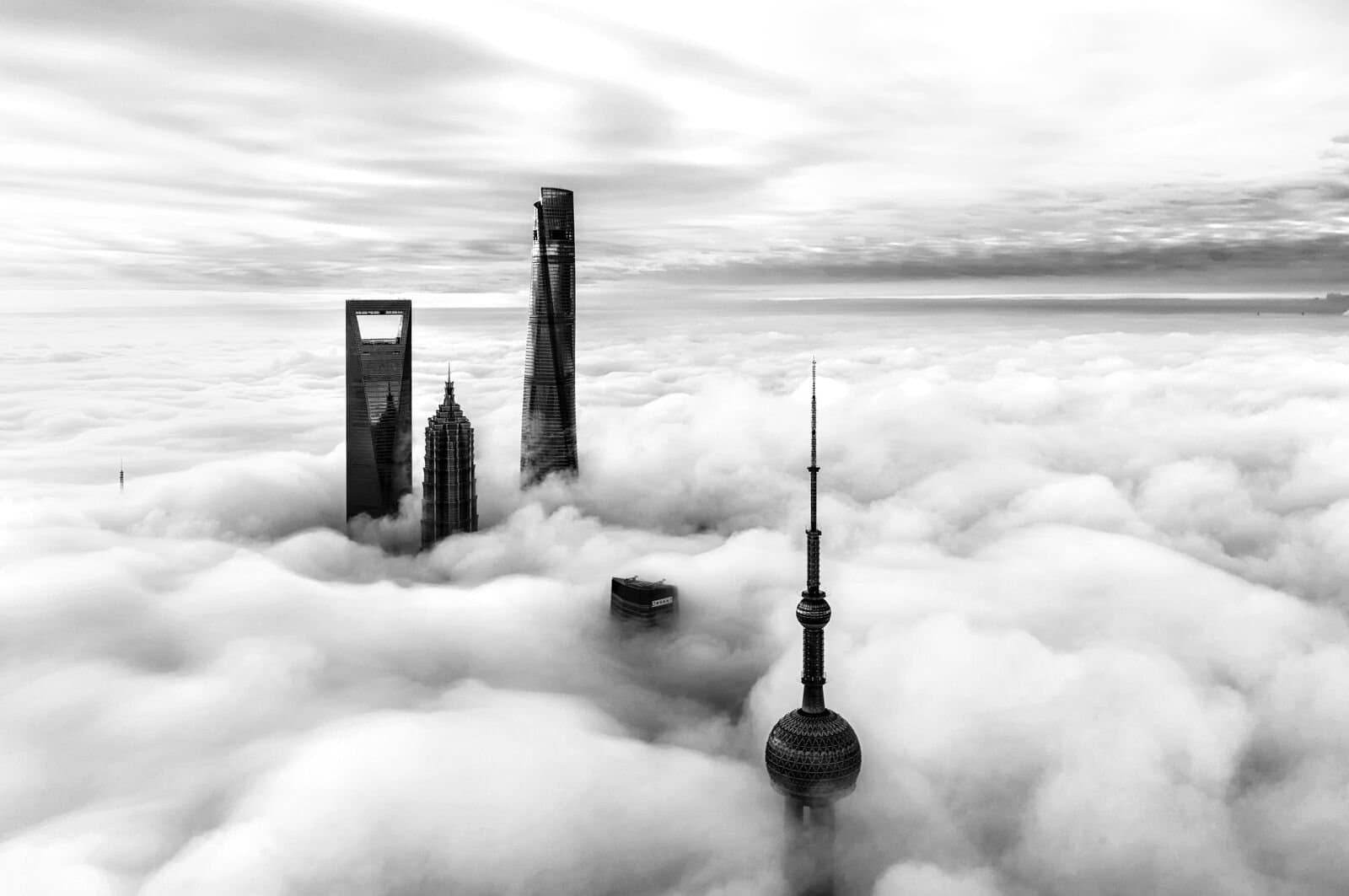sky scrapers peering through the clouds