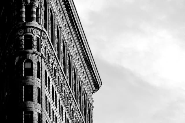 view of architectural building with cloudy sky